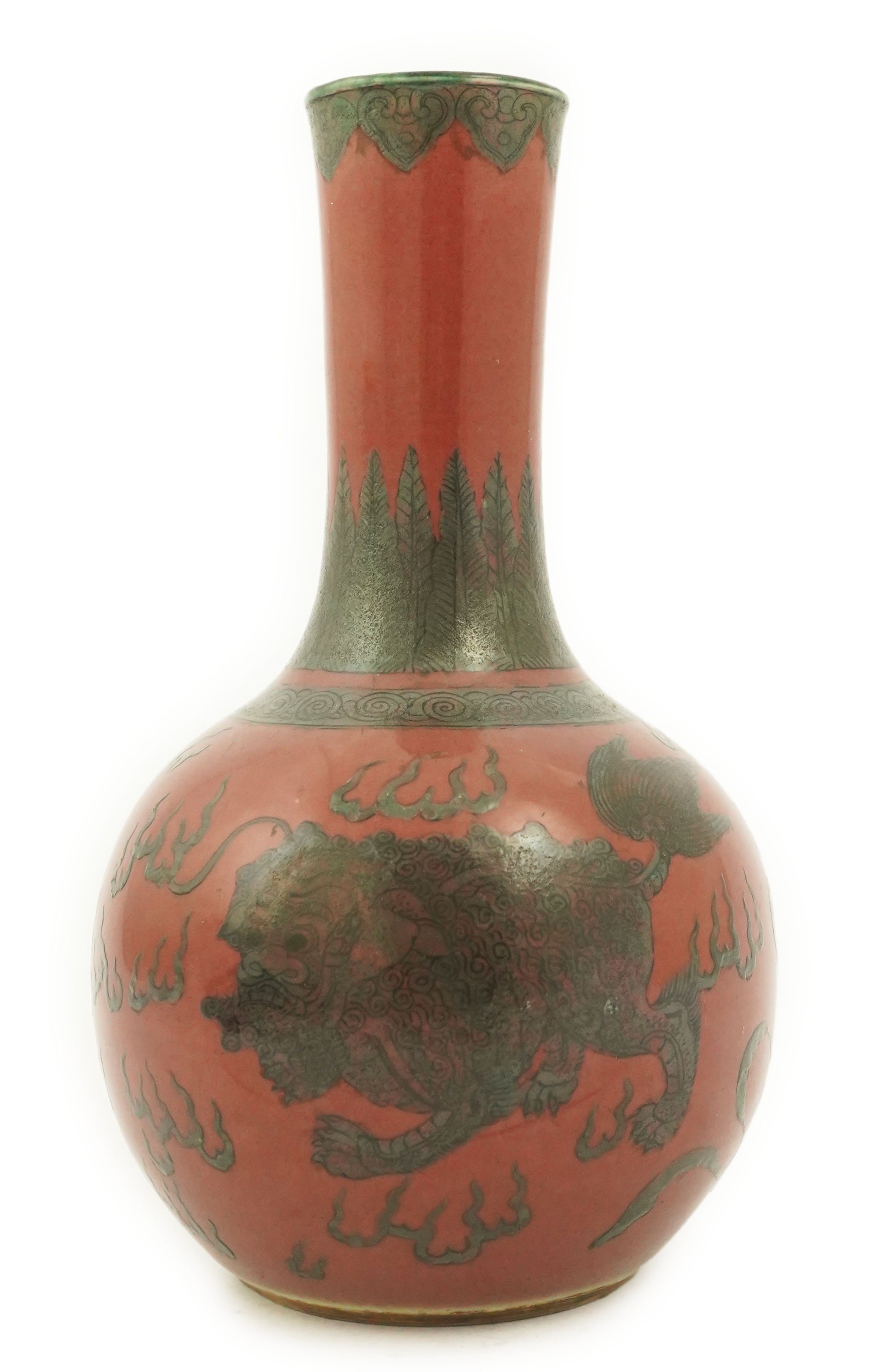 A Chinese green enamelled sang de boeuf ground 'lion' bottle vase, probably 18th century